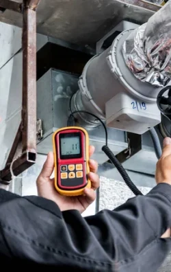 depositphotos_316363558-stock-photo-technician-use-hand-held-anemometer